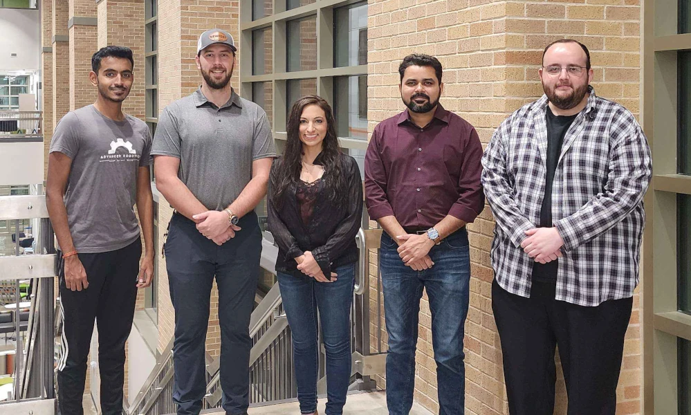 Image of Advanced Robotics Executive Board standing in front of a staircase